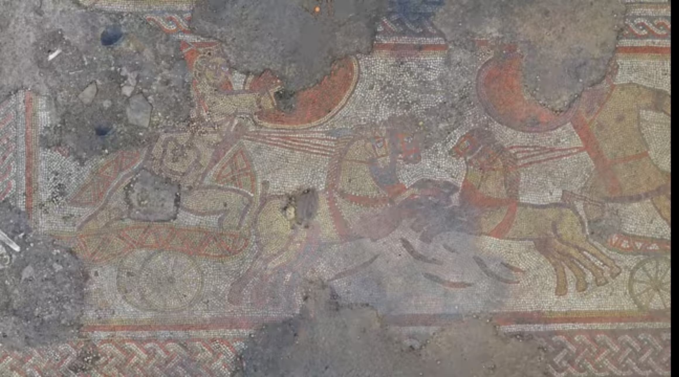First panel of Rutland mosaic featuring Achilles versus Hector on chariots.